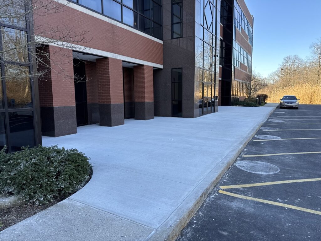 Fresh concrete installation at Allentown office park showcases Swan Co.'s precision in creating a welcoming business environment.