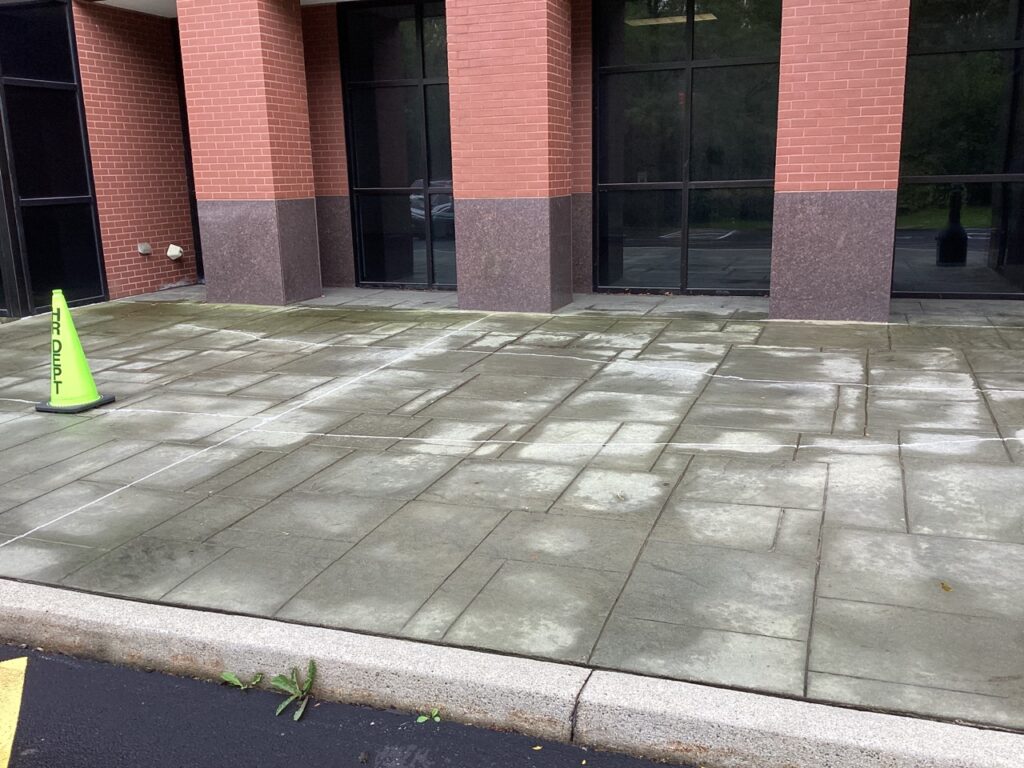 Before and after comparison of concrete replacement at Allentown office park, illustrating Swan Co.'s quality craftsmanship.